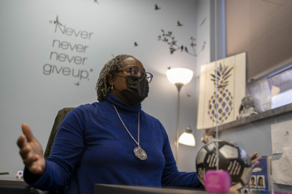 A Hackley Community Care therapist sits in her office with a mask during COVID protocols. HCC provides mental health services for Muskegon residents.